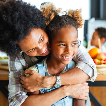 Photo of mom hugging daughter