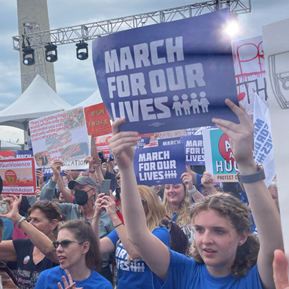 Photo of person holding up sign at March for Our Lives