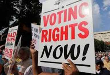 Sign reads: Voting Rights Now
