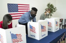 Photo of people voting